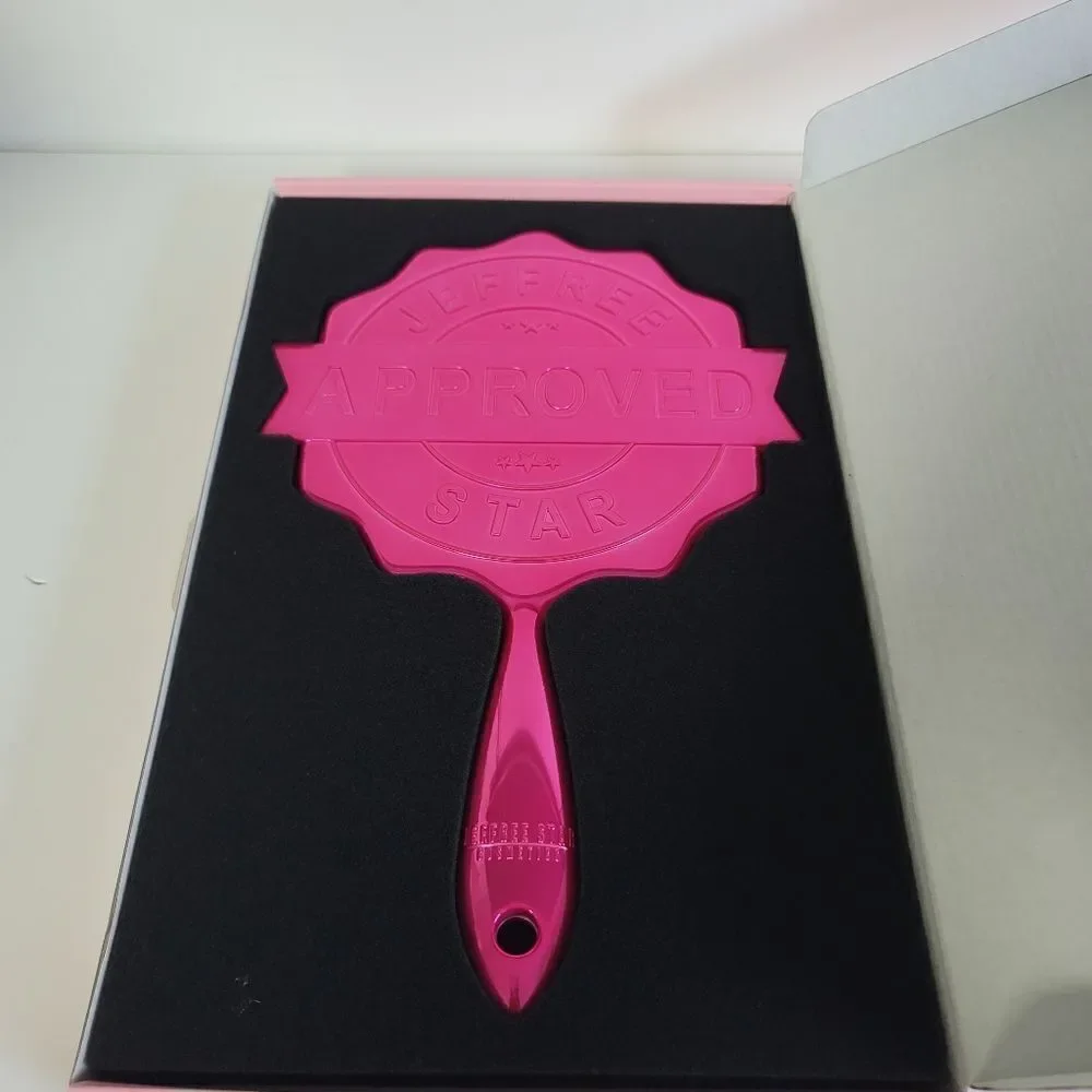 Jeffree Star hand mirror pink chrome